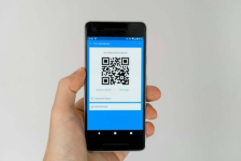 Smartphone displaying QR code for digital product passport